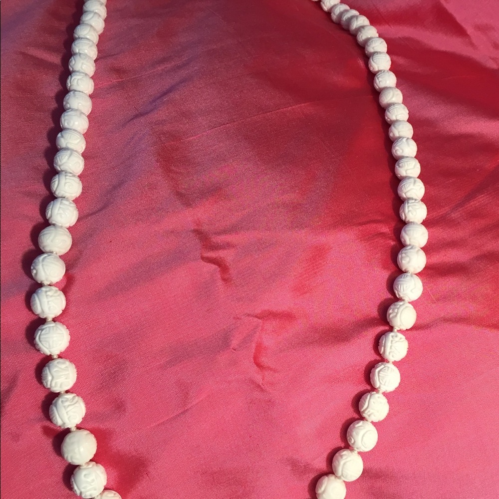 Carved bone necklace